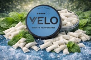 VELO Nicotine Pouches - Mighty Peppermint 24 mg Open can showing slim all white portions of VELO Mighty Peppermint 17mg extra strong nicotine pouches