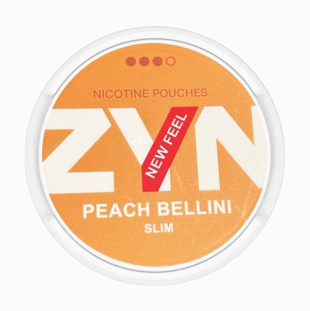 Buy All-White ZYN Peach Bellini 12.5mg Mini Pouch Australia Close-up of an all-white 12.5mg ZYN Peach Bellini mini dry nicotine pouch next to open can. | zyn peach bellini 12 5mg mini pouch detail.jpg